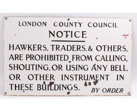 An original enamel London County Council notice sign, detailing "Hawkers, traders &amp; others are Prohibited from calling, s