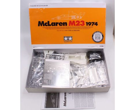 A Tamiya No. 12045 1/12 scale Big Scale Series 45 plastic kit for a McLaren M23 1974 Formula One race car