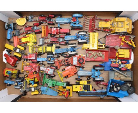 A tray of mixed play-worn Britains, Corgi, Matchbox, and other tractors and farming related diecasts, with examples including