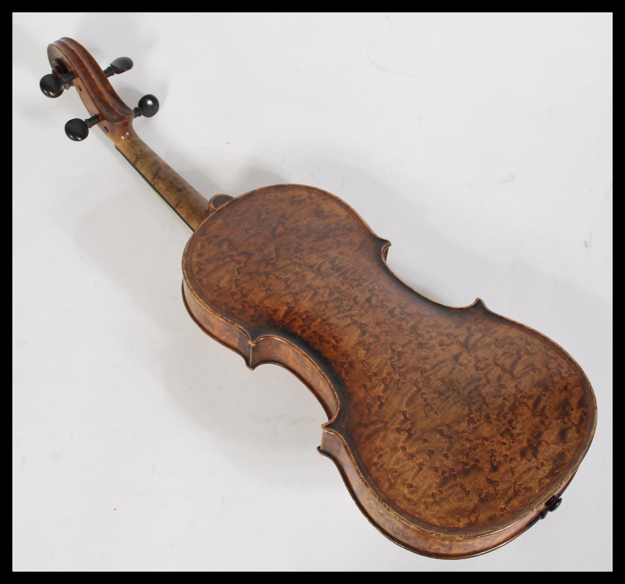 A 19th century Victorian walnut violin with a horse hair bow with