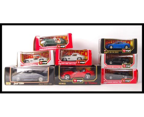 A collection of 8x Burago scale precision diecast model cars to include; Dodge Viper RT/10 1:18 scale and special edition Jag