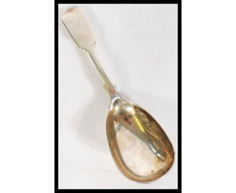 A 19th century Victorian silver hallmarked caddy spoon in the fiddle pattern being hallmarked Robert Williams and Sons Exeter