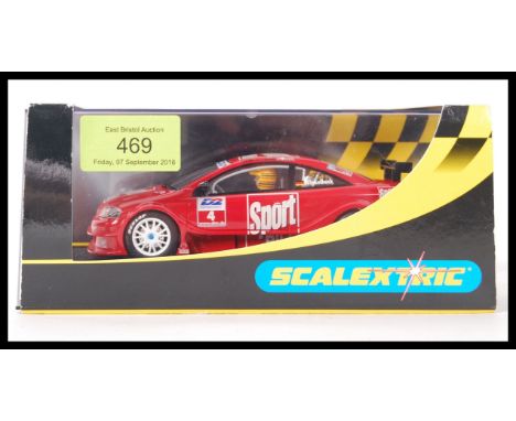 A Scalextric 1:32 scale model slot racing car, Opel V8 Coupe ' Sport Bild No4 ' c2298. Appears mint within original box.&nbsp