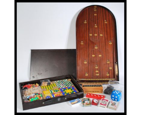 A vintage bagatelle board along with a vintage games compendium set and other various games. Please see images.&nbsp;Measures