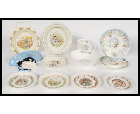 A collection of 20th century Royal Doulton ceramics to include a Snowman Party Time teacup and saucer, side plate, bowl and m