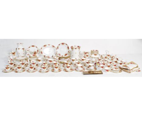 A extensive vintage retro Royal Albert china service with the Old Country Roses pattern and gilt rims to include, a condiment