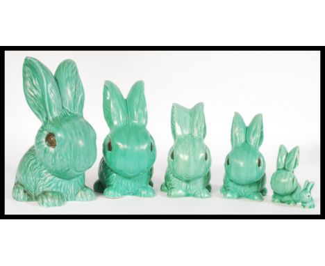 A selection of vintage 20th century graduating ceramic green SylvaC figurines having stamped numbers 1028, 1027, 1026, 1065.&