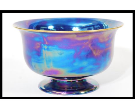A Carlton ware pedestal lustre bowl raised on tapered foot with makers marks to base. Measures 12.5 cm high and 21 cm diamete