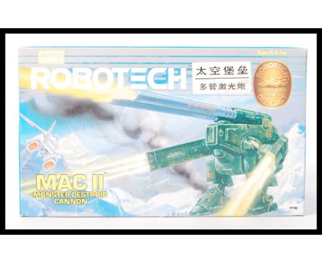 An original vintage Harmony Gold made Robotech Mac II Monster Destroid Cannon diecast scale model. Appears to be factory seal