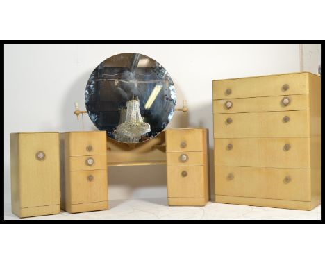 A vintage / retro 20th Century Art Deco bedroom suite comprising of a drop centre dressing table, bedside cabinet and a chest