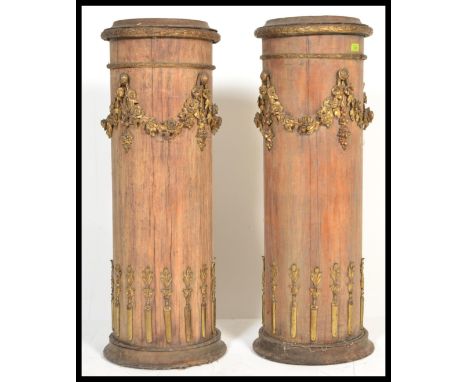 A pair of late 19th Century pedestal column plant / bust stands. Each pedestal heavily decorated with applied gilt metal ormo