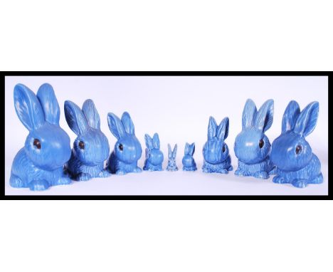 A collection of vintage ceramic SylvaC blue rabbits to include one small long eared rabbit and one match striker, and a serie