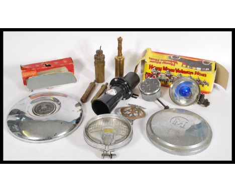A selection of vintage 20th century car parts to include brass blow lamps by Abbott Birks and Moore &amp; Wright, an AA badge