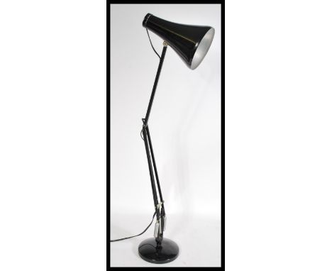 A mid 20th century retro industrial Herbert Terry Anglepoise desk lamp raised on a circular base with chrome springs conical 