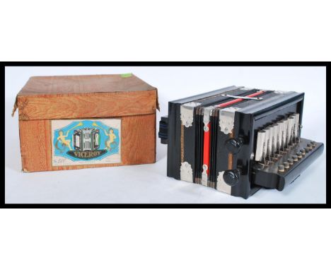 A vintage retro 20th century accordion musical instrument complete in box. Please see images.&nbsp;Measures: 12.5cm high x 22