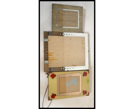 A collection of three early 20th Century picture frames to include wall hanging and easel. Measures 45 cm x 37 cm.