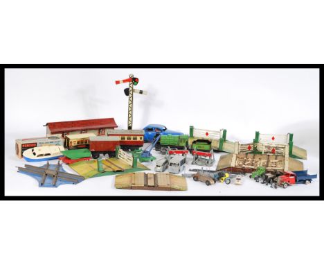 A collection of 20th century vintage toys to include a boxed penguin plastic high speed cruiser, a Hornby series train with P