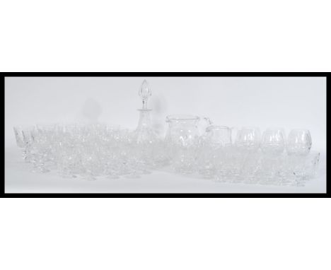 A 63 piece set of Royal Brierley crystal glassware, including a decanter and two jugs, brandy, whiskey, wine, sherry and port