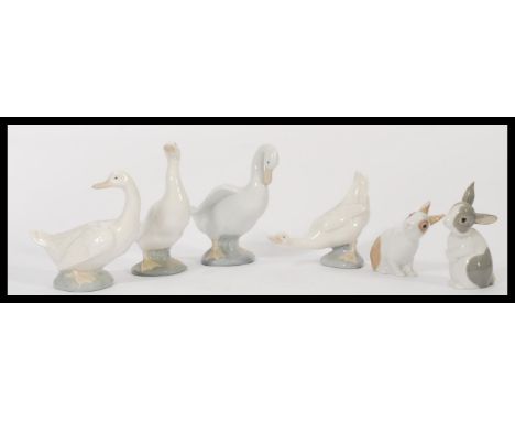 A group of Nao (Lladro) figures of animals to include four geese and two rabbits. Please see images. (6). Measures 15cms high