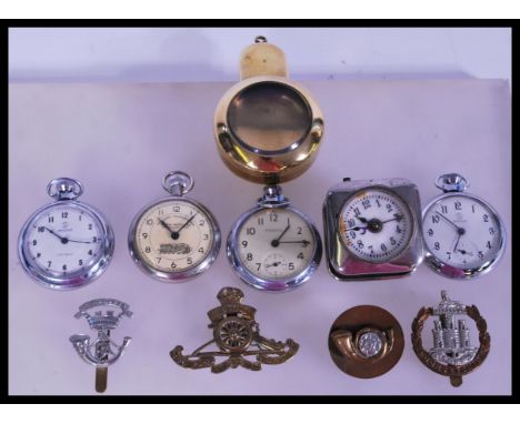 A collection of 20th century time pieces to include pocket watches by Railway Timekeeper, Services, Ingersoll and a brass wat