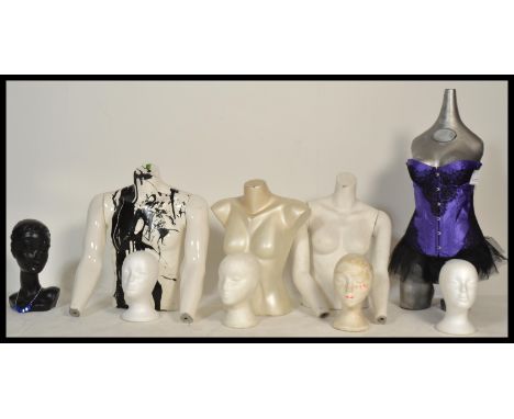 A collection of vintage male and female torso mannequins including five polystyrene head mannequin, four upper body mannequin