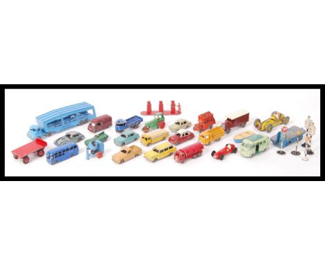 A group of vintage Matchbox Lesney diecast model cars to include car transporter etc. Along with diecast petrol pumps. Please
