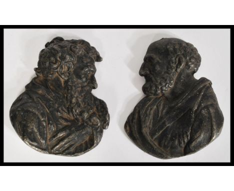 Two 19th century lead / metal bust plaques of Greek philosophers Plato and Aristotle facing toward each other with detailed f