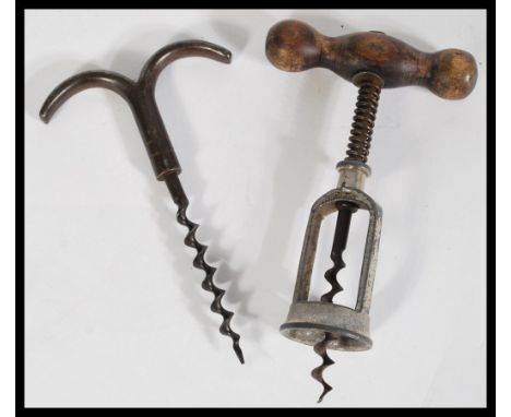 Two vintage early 20th century corkscrews including an eyebrow example by Berkeley and Co and a Hercules corkscrew.&nbsp;meas