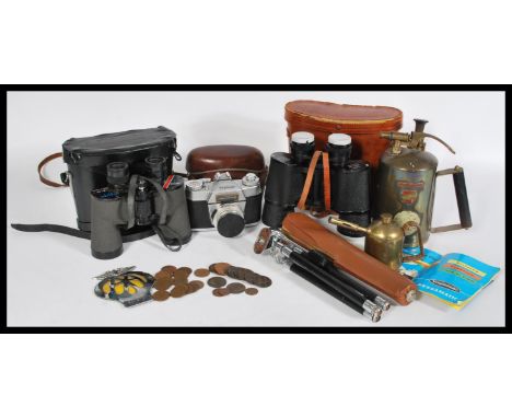 A collection of vintage items to include a Vivo tripod with case, an AA car badge, a Voighander Bessamatic camera in leather 