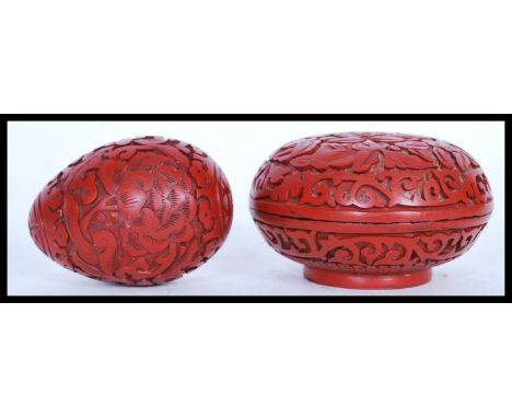 A 19th century Cinnabar lacquer ladies trinket / makeup box lidded pot having decoration of flowers and scrolls. Along with a