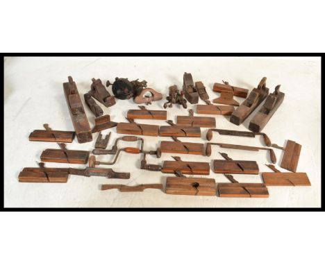 A good collection of vintage woodworking tools to include large wood plane, multiple smaller wood planes etc. Please see imag