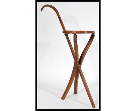 A Thonet metamorphic bent wood / folding walking cane / shooting stick, metamorphic action with cane seat.&nbsp;Measures: 86.