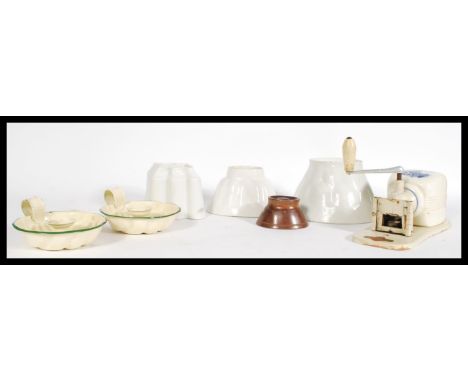 A collection of late 19th and early 20th Century Jelly moulds to include an example by Shelly together with a Dutch wall hang
