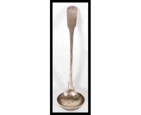An early 19th century Georgian sauce ladle in the Fiddle pattern. Hallmarked for Glasgow 1821 makers G.E?. Weighs 33.2 grams.