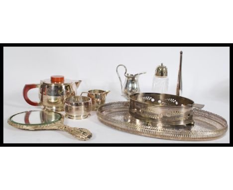 A group of vintage silver plated wares to include an Art Deco three piece tea service. Please see images.&nbsp;Measures: 3.5c