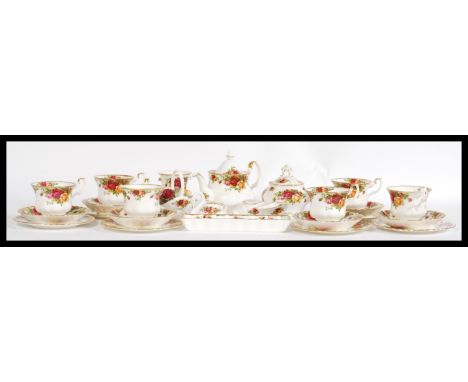 Royal Albert - A vintage 1960's Royal Albert bone China tea service in the Country Roses pattern, consisting of Teapot, sugar