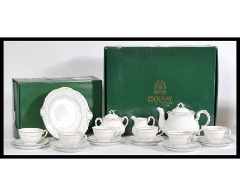 A vintage boxed Zsolnay Hungarian ceramic tea service consisting of cup saucers and side plates, teapot etc. Please see image