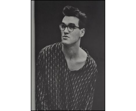 A selection of vintage posters of the Smiths to include a gold Morrisey 'Suede head' the single poster, a black and white pho