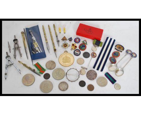 A collection of vintage items to include enamel badges, coins, medals and medal ribbons, etc. Please see images.