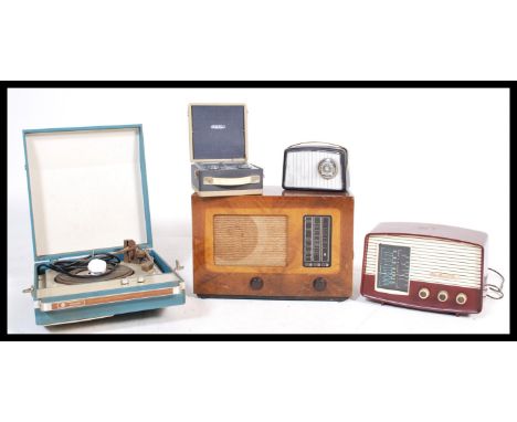 A collection of vintage 20th century retro music players to include, a Dansette gem radio, a HMV bakelite cased radio, a Pye 