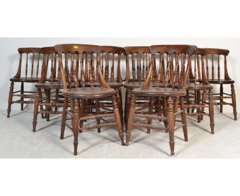 A long run /&nbsp; set of 12 19th century Victorian Windsor elm and beech stick back dining chairs having solid elm seats and