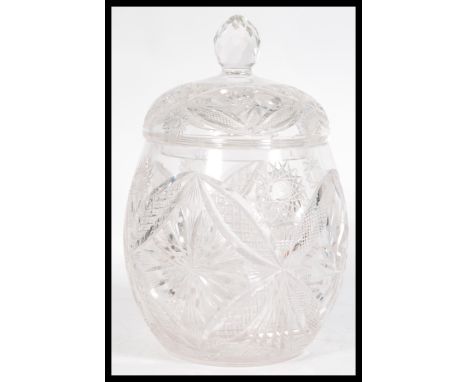 A 19th century Victorian Rumtopf crystal decanter lidded jar with a floral design and a cut glass finial.&nbsp;Measures: 36cm