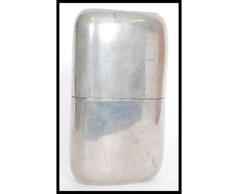 An over sized 20th century silver plated hip flask with a screw top.&nbsp;Measures: 20.5cm high x 11cm wide.