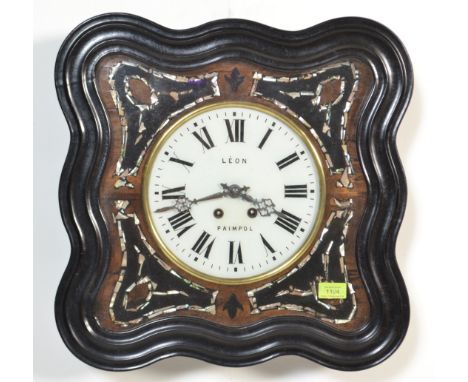 A French 19th century ebonised ' Leon Paimpol ' bulls eye clock having enamel dial with mother of pearl insets and faceted ha