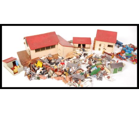 A collection of&nbsp; Britain's made plastic model farm yard figures , animals and buildings . To include; a believed early p