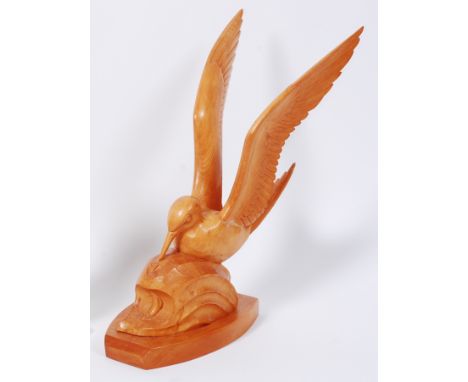 Wharton Lang of St Ives school - A carved sycamore model of a seagull hunting a fish, raised on shaped integral base, signed 