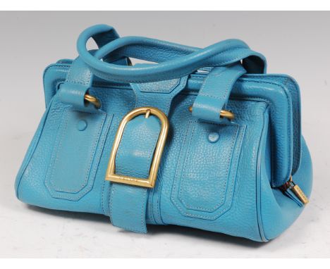 A 1980s Celine sky blue ladies leather handbag, having heavy gilt brass mounts, twin shoulder straps and buckled clasp, the c