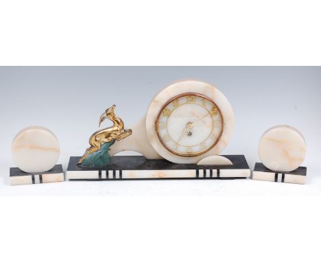 An Art Deco marble, onyx and black slate three piece clock garniture, having circular pierced gilt metal chapter ring, French