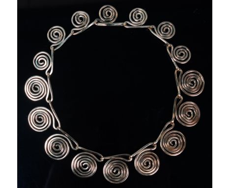 After a design for Christian Dior - An 18ct gold necklace, of sectional swirling and tapering form, weight 74g, length 39cm