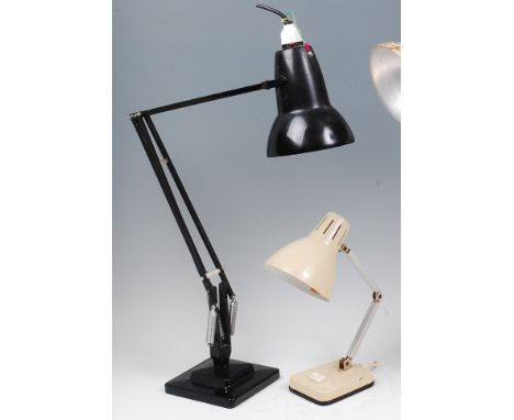 A Herbert Terry black painted anglepoise desk lamp, of typical hinged rotating form, impressed backstamp verso, max. h.90cm; 